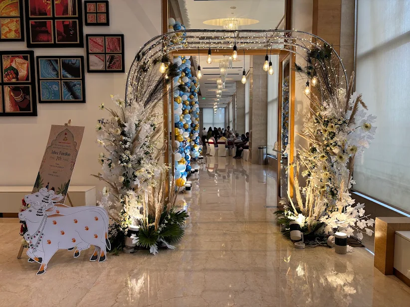 The Event Enchanters live luxury floral grand entrance and metallic arch architecture at 5-star Kolkata hotel banquet